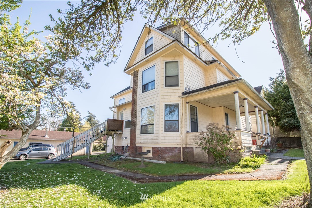 front view of a house with a yard