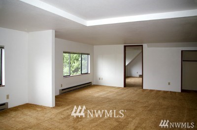 211 East 3rd Street Aberdeen, WA 98520 - Photo 25 of 27 a view of an empty room with a window