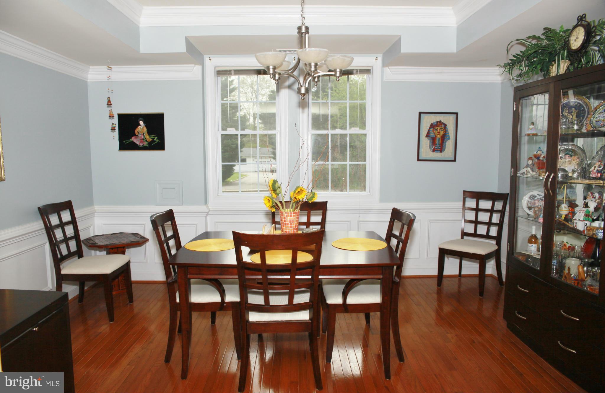 5313 Franconia Road Alexandria, VA 22310 - Photo 11 of 29 a dining room with furniture a window and wooden floor