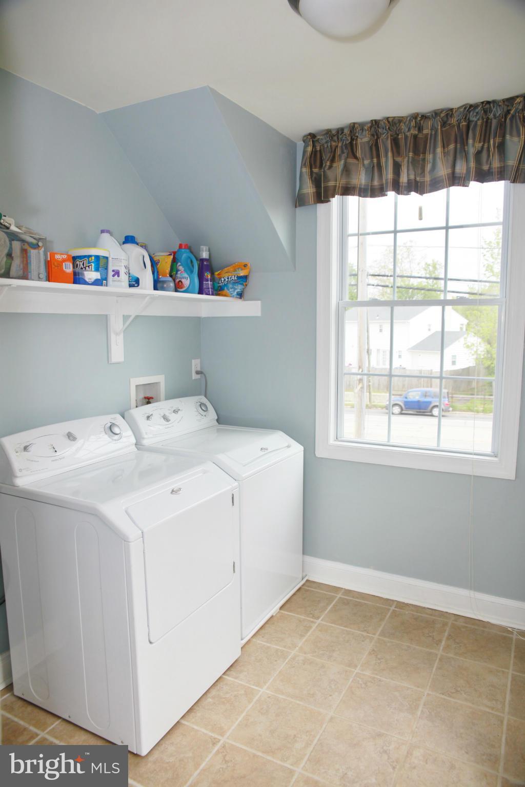 5313 Franconia Road Alexandria, VA 22310 - Photo 19 of 29 a utility room with a window and shelf
