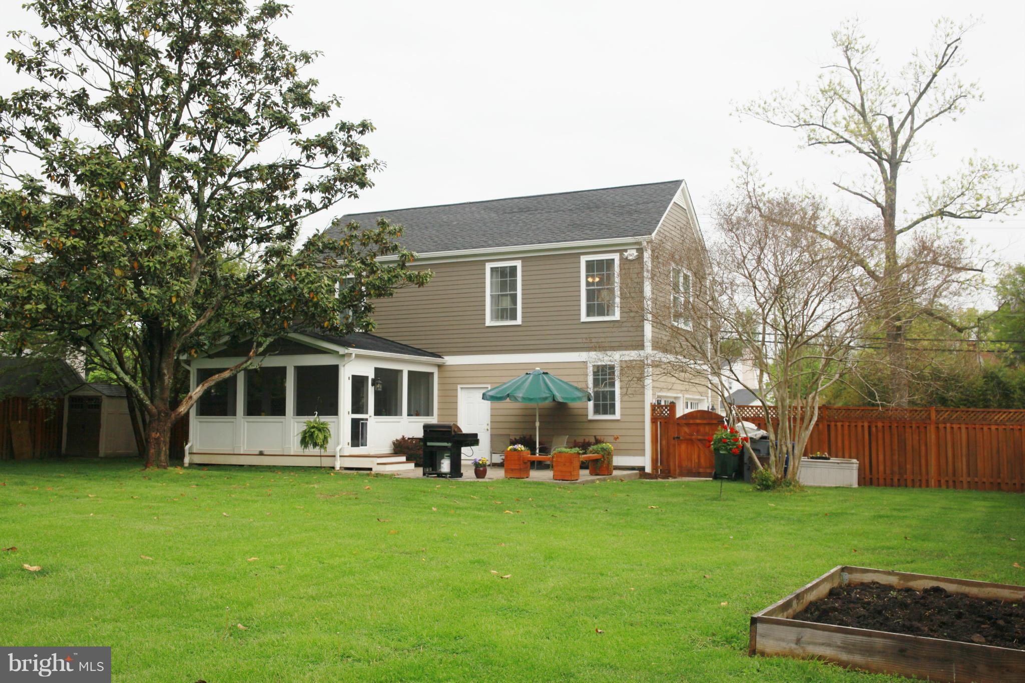 5313 Franconia Road Alexandria, VA 22310 - Photo 3 of 29 a front view of house with yard and outdoor seating