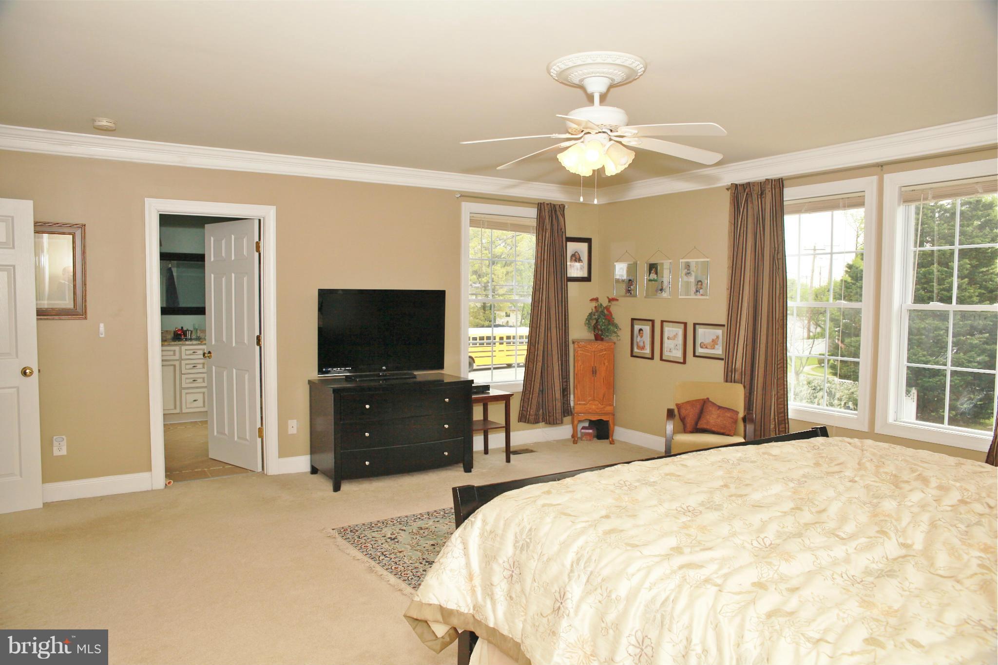 5313 Franconia Road Alexandria, VA 22310 - Photo 23 of 29 a bedroom with a bed and a flat screen tv