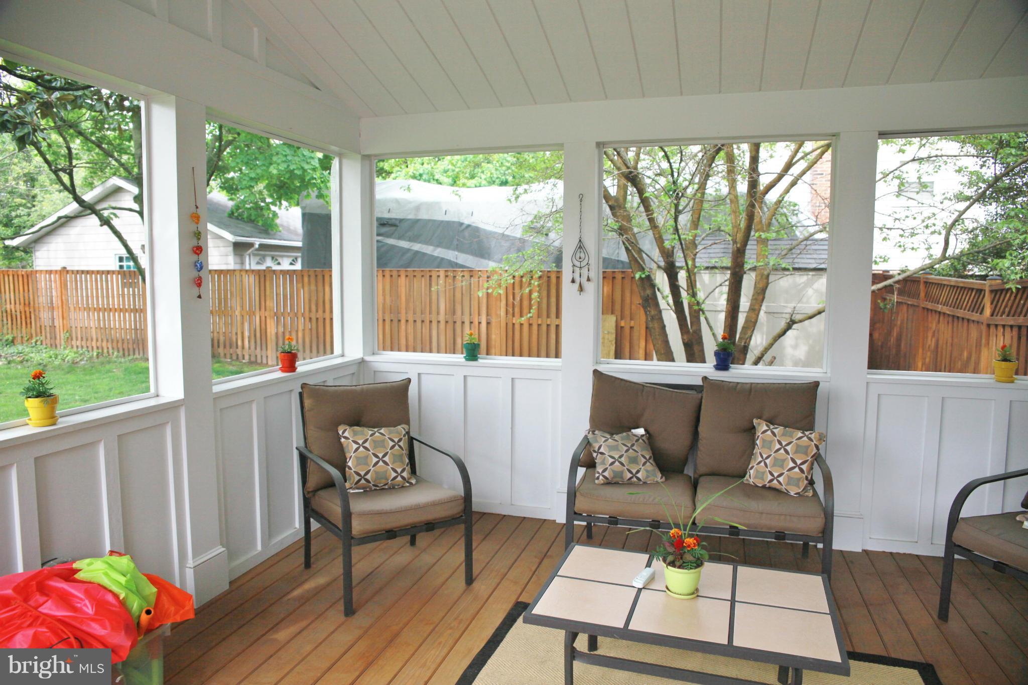 5313 Franconia Road Alexandria, VA 22310 - Photo 27 of 29 a living room with large windows and a table
