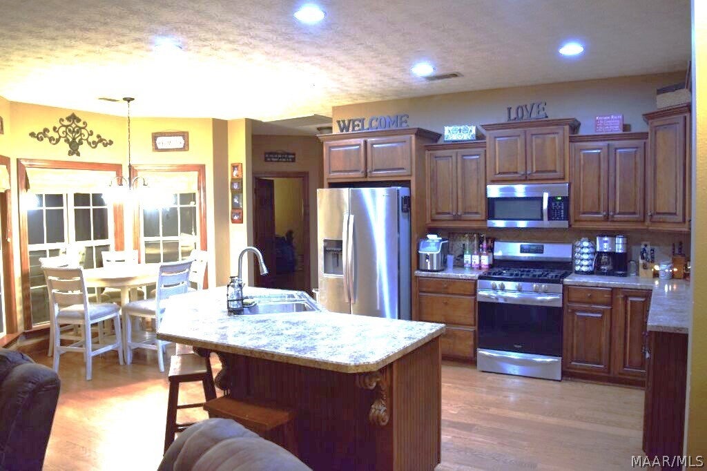 897 Mullins Road Eclectic, AL 36024 - Photo 5 of 13 Large kitchen with island