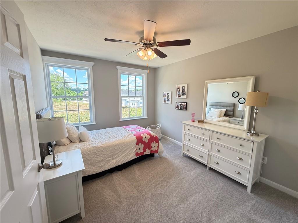 178 Lockheed Drive Coraopolis, PA 15108 - Photo 20 of 22 a bedroom with a bed and a dresser
