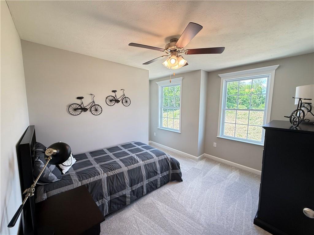 178 Lockheed Drive Coraopolis, PA 15108 - Photo 22 of 22 a bedroom with a bed and a window