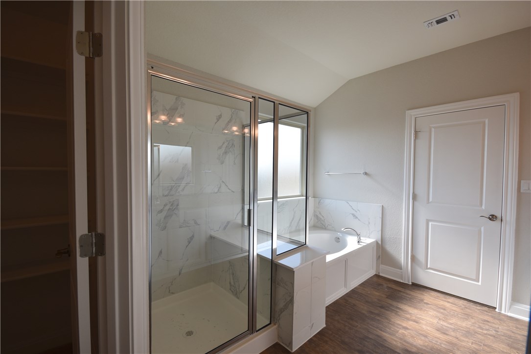 15911 Cessida Street Austin, TX 78728 - Photo 15 of 22 Separate Tube and Oversized Shower at Master Bath.