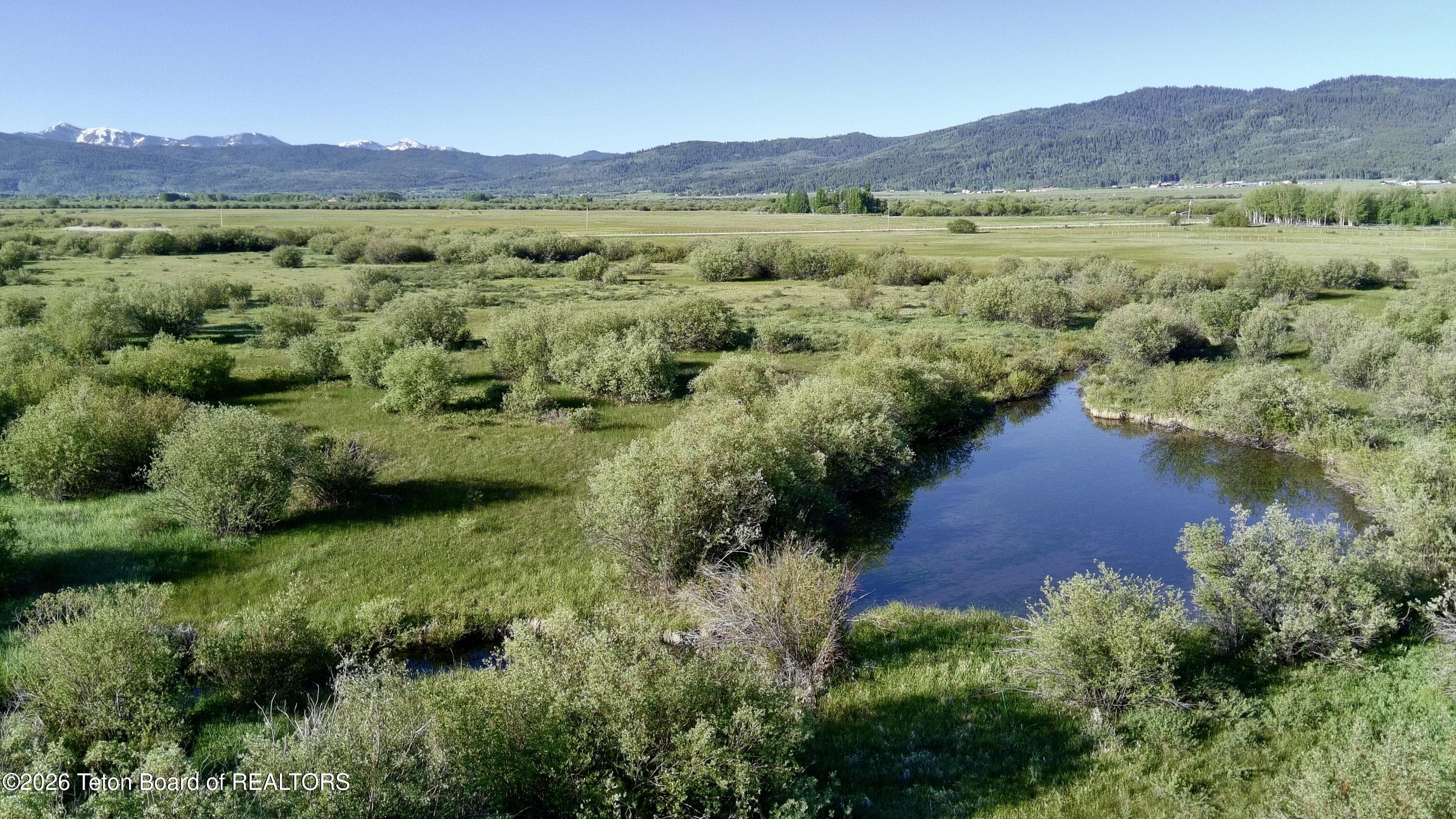 3329 Trout Creek Road Victor, ID 83455 - Photo 6 of 12 Aerial of pond