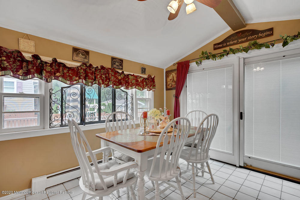 223 Delaware Avenue Oakhurst, NJ 07755 - Photo 11 of 30 a view of a dining room with furniture window and outside view