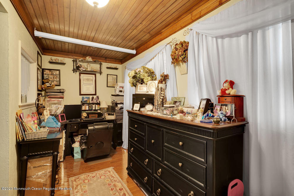 223 Delaware Avenue Oakhurst, NJ 07755 - Photo 13 of 30 a room with a large window and dining table