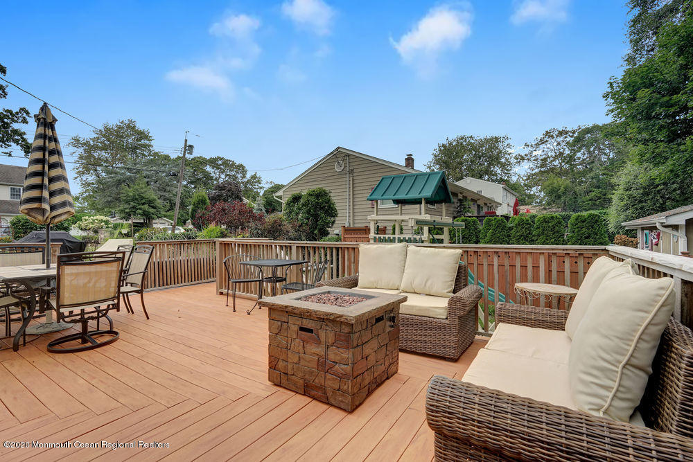 223 Delaware Avenue Oakhurst, NJ 07755 - Photo 20 of 30 a view of a roof deck with furniture