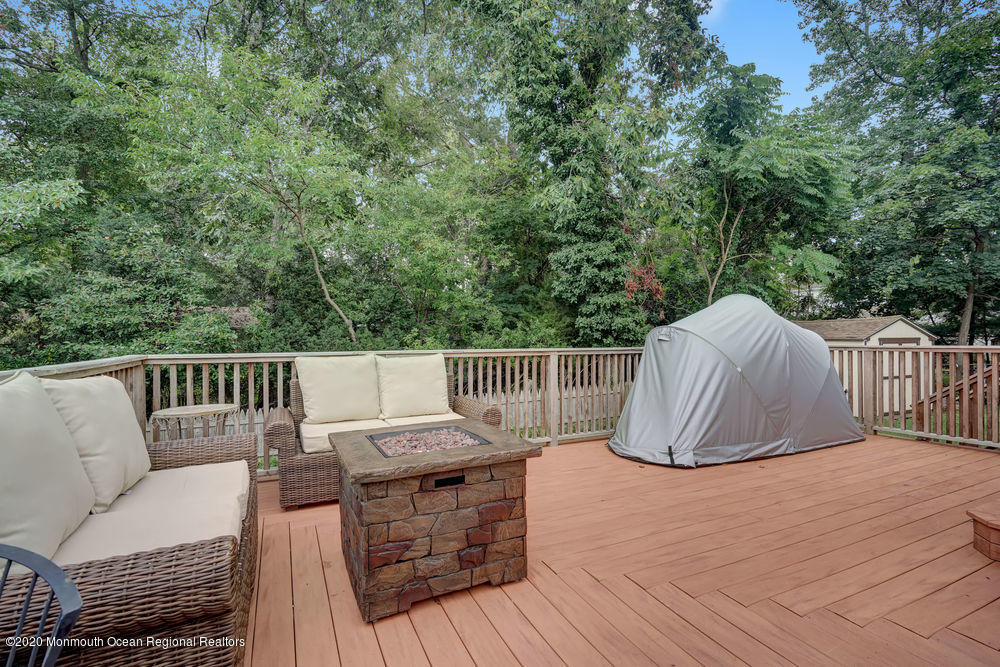 223 Delaware Avenue Oakhurst, NJ 07755 - Photo 22 of 30 a view of balcony with deck and outdoor seating