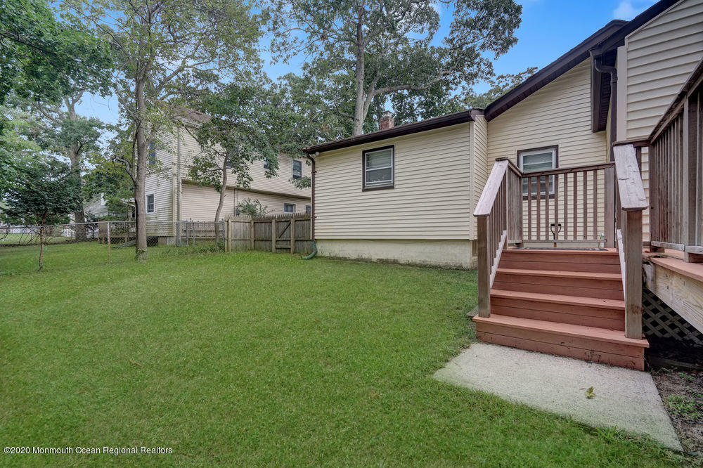 223 Delaware Avenue Oakhurst, NJ 07755 - Photo 28 of 30 a view of a house with backyard