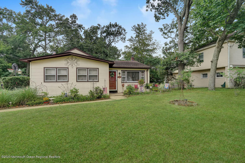 223 Delaware Avenue Oakhurst, NJ 07755 - Photo 29 of 30 a front view of house with yard and green space