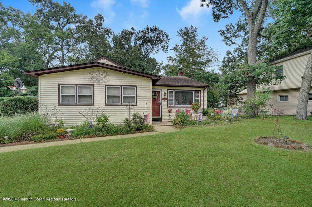 223 Delaware Avenue Oakhurst, NJ 07755 - Photo 30 of 30 a view of a house with a yard
