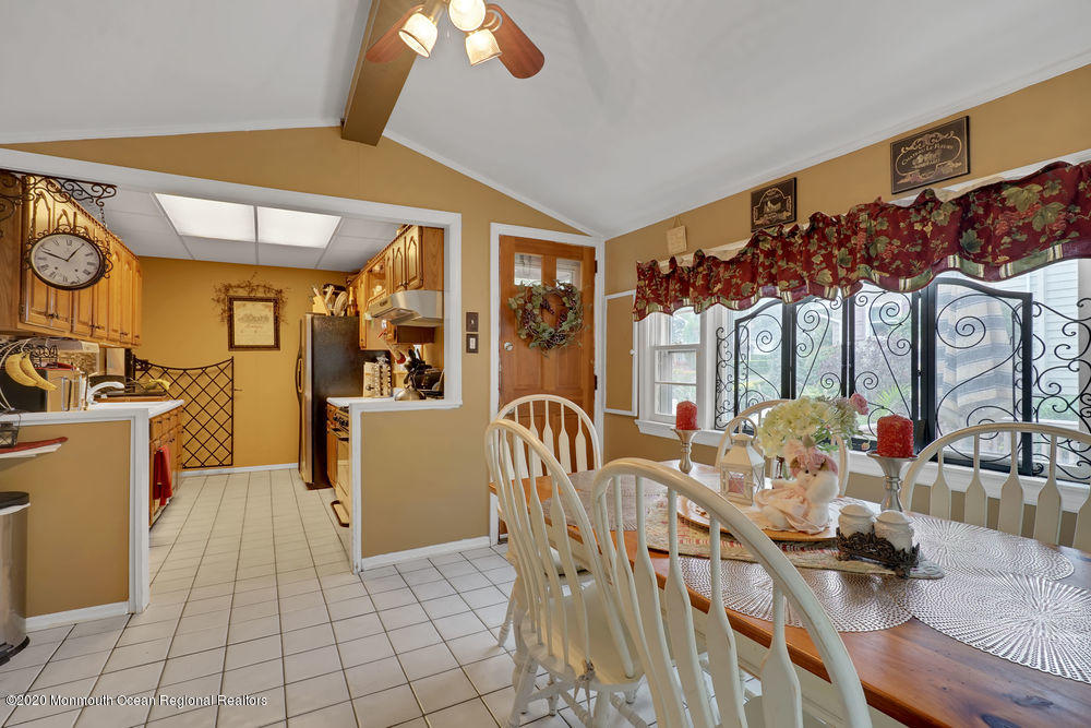 223 Delaware Avenue Oakhurst, NJ 07755 - Photo 10 of 30 a dining room with furniture and wooden floor