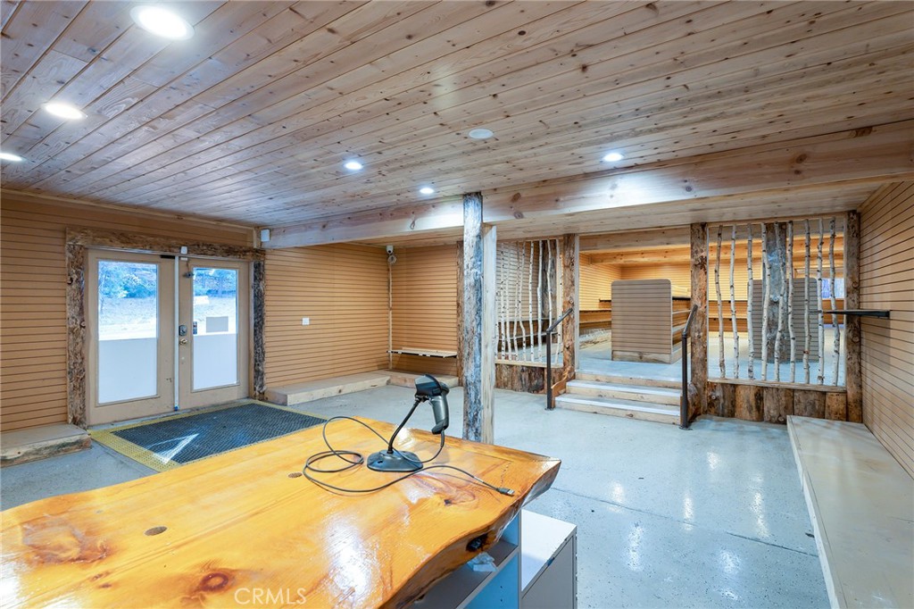 26890 Highway 189 Blue Jay, CA 92317 - Photo 16 of 46 a room with lots of table and chairs