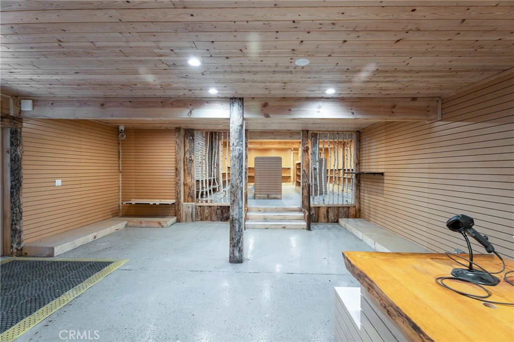 26890 Highway 189 Blue Jay, CA 92317 - Photo 17 of 46 a view of empty room with windows