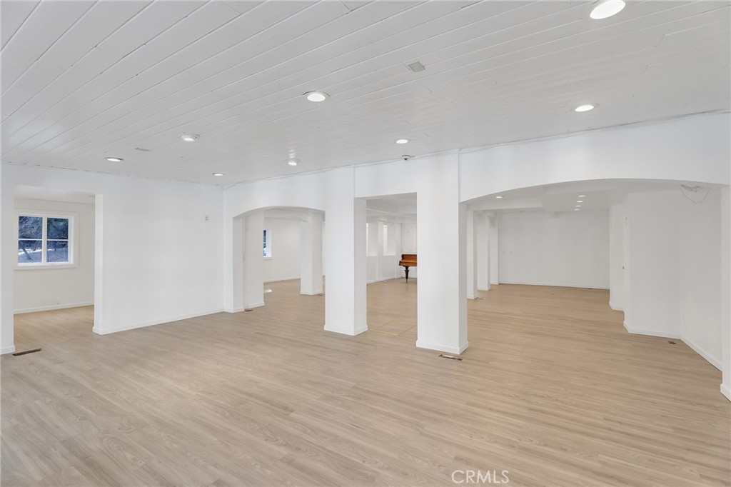 26890 Highway 189 Blue Jay, CA 92317 - Photo 25 of 46 a view of empty room with wooden floor