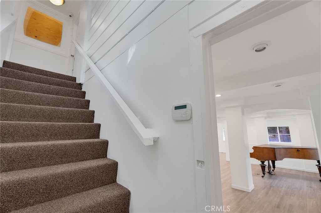 26890 Highway 189 Blue Jay, CA 92317 - Photo 33 of 46 a view of entryway and hall with wooden floor
