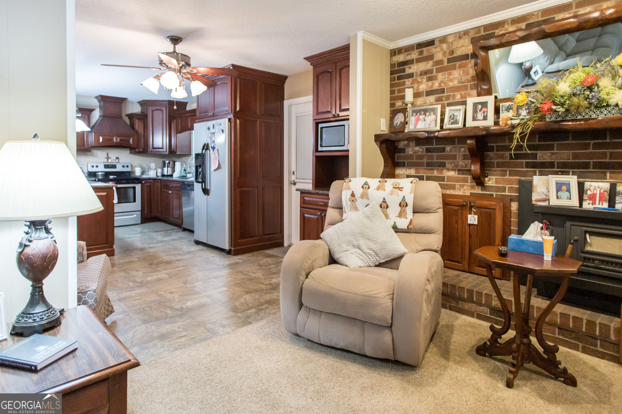 5084 White Hall Church Road Waycross, GA 31503 - Photo 11 of 41 a living room with furniture and a fireplace