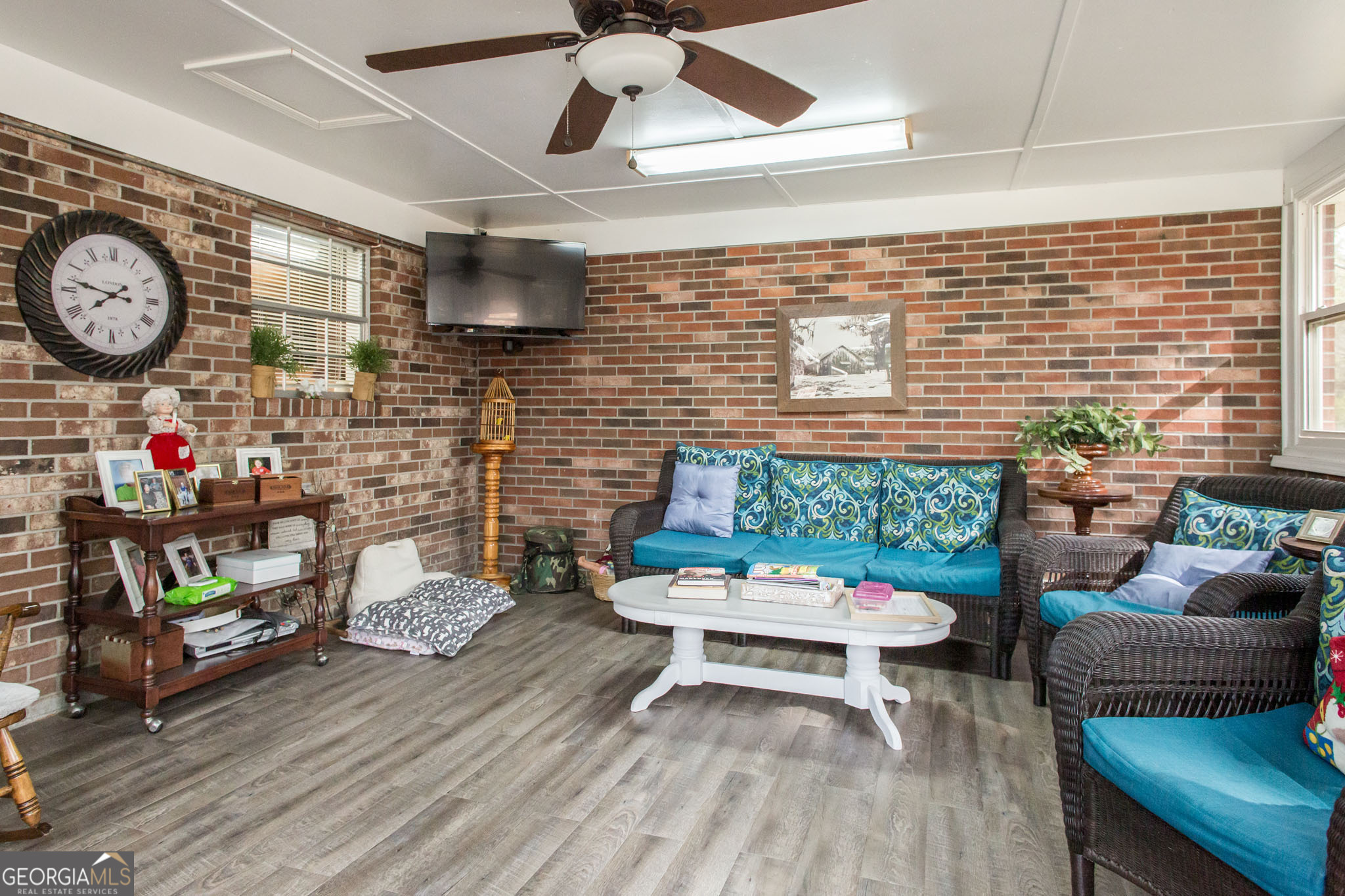 5084 White Hall Church Road Waycross, GA 31503 - Photo 18 of 41 a living room with furniture and a wooden floor