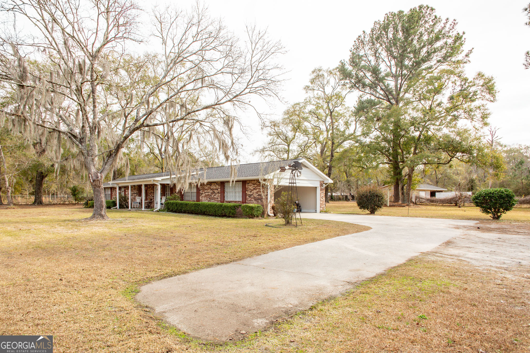 5084 White Hall Church Road Waycross, GA 31503 - Photo 38 of 41 a front view of house with yard and trees around