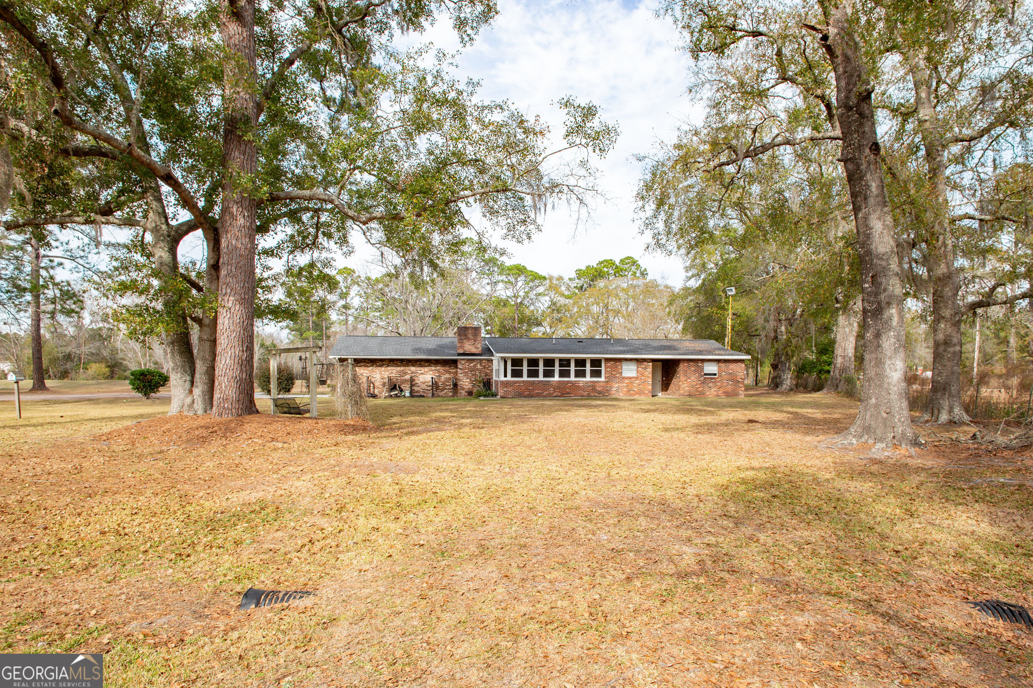 5084 White Hall Church Road Waycross, GA 31503 - Photo 39 of 41 front view of house with yard and trees