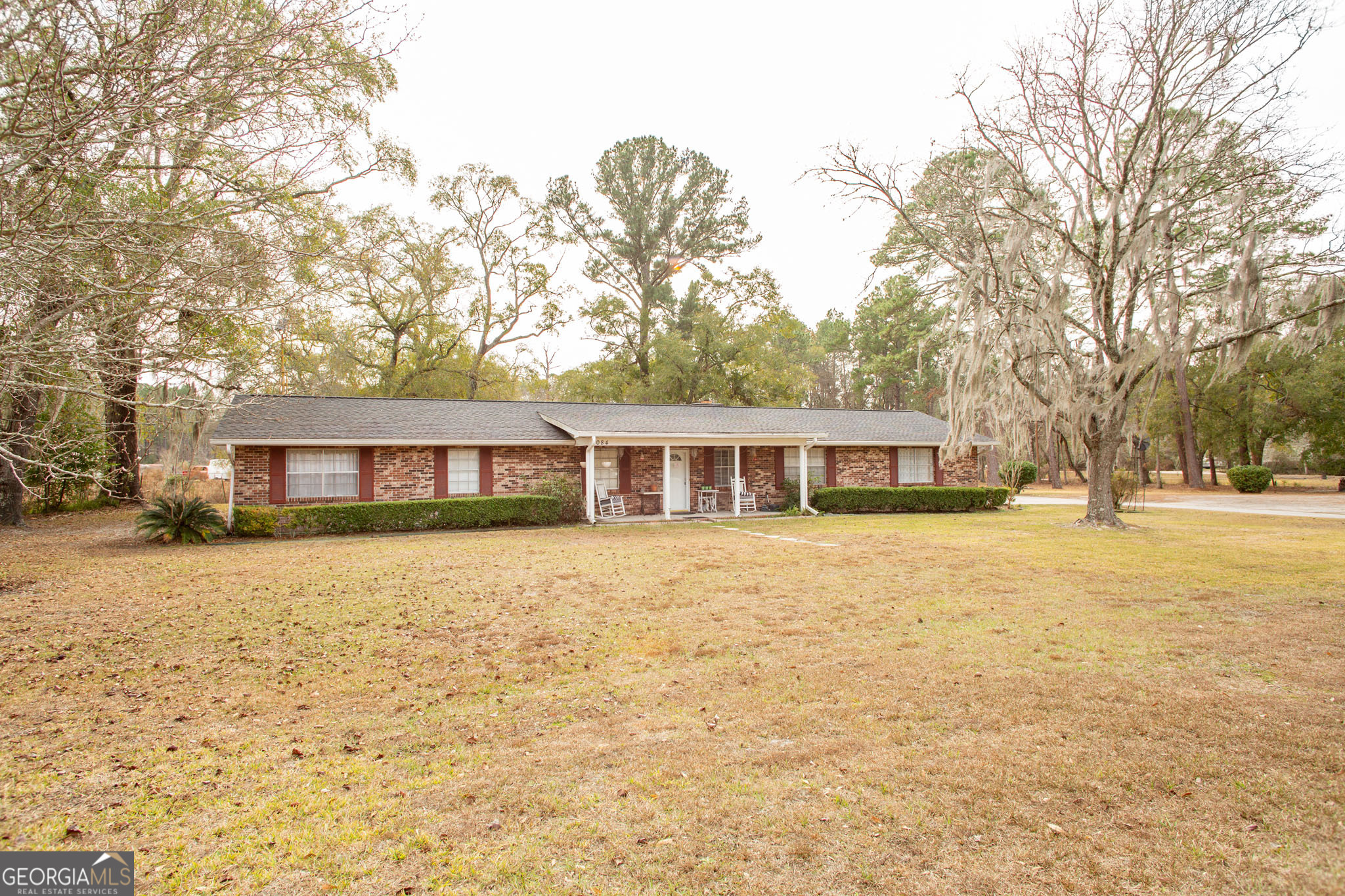 5084 White Hall Church Road Waycross, GA 31503 - Photo 5 of 41 a front view of a house with a yard