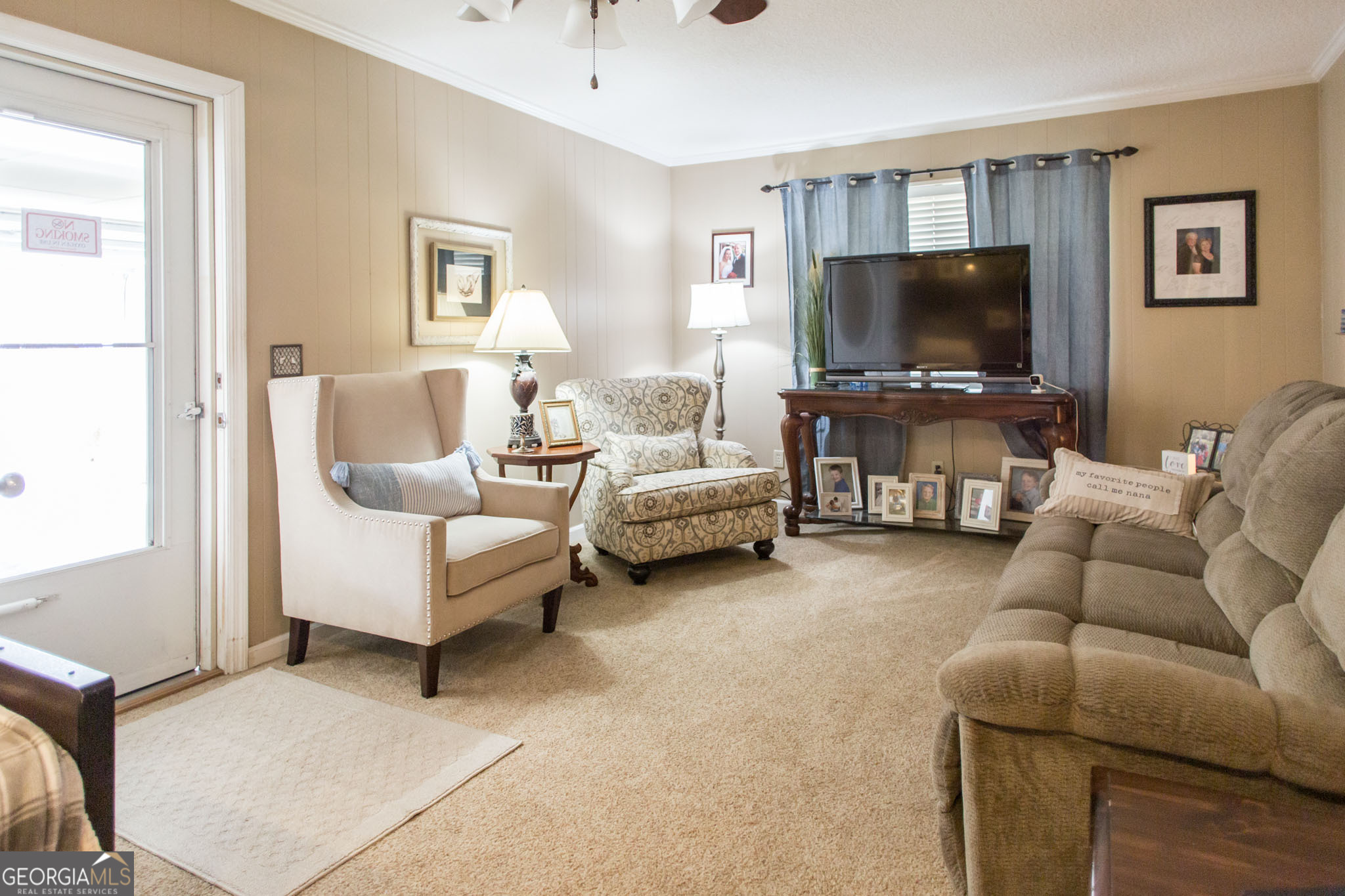 5084 White Hall Church Road Waycross, GA 31503 - Photo 9 of 41 a living room with furniture and a flat screen tv