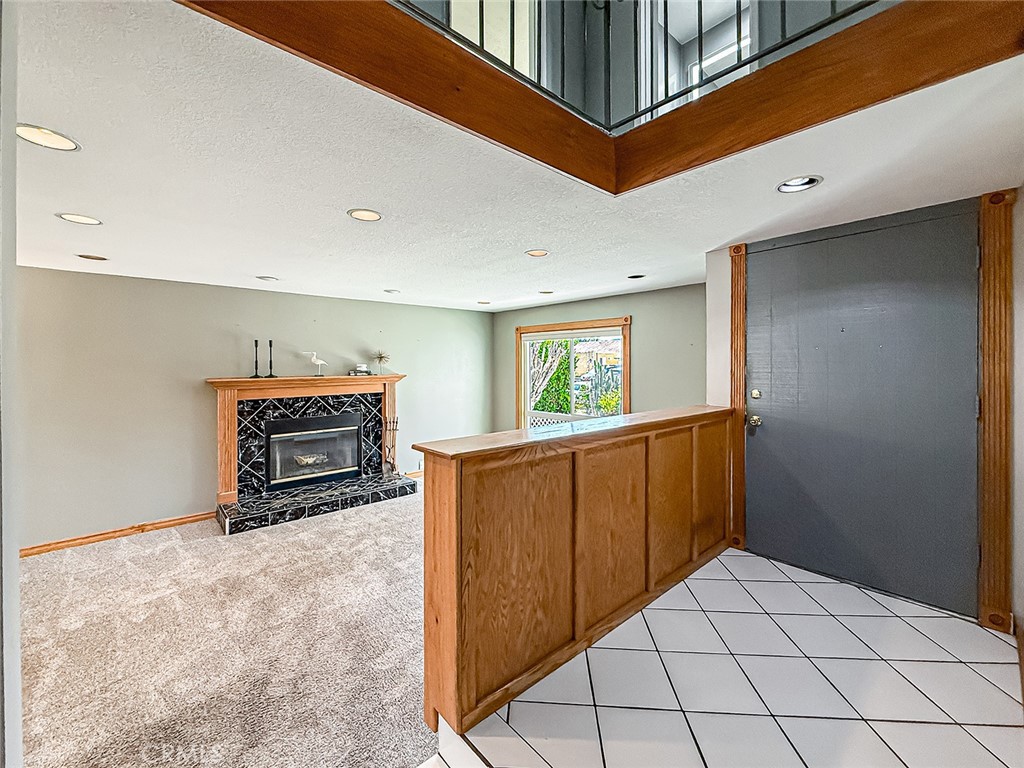 2235 Burnside Street Simi Valley, CA 93065 - Photo 13 of 71 a view of an empty room with a fireplace