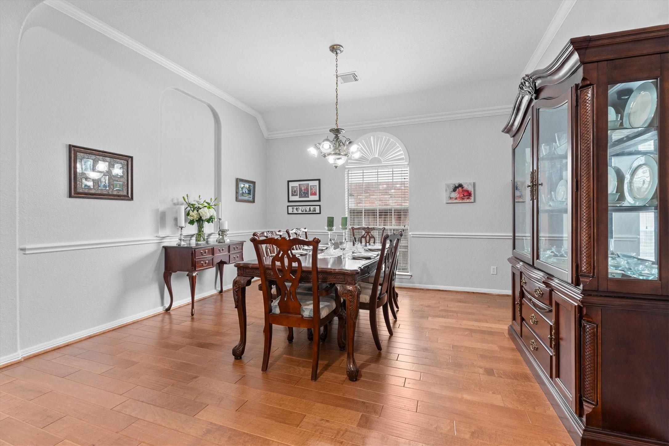 9406 Lochflora Drive Spring, TX 77379 - Photo 9 of 49 a view of a dining room with furniture window and wooden floor