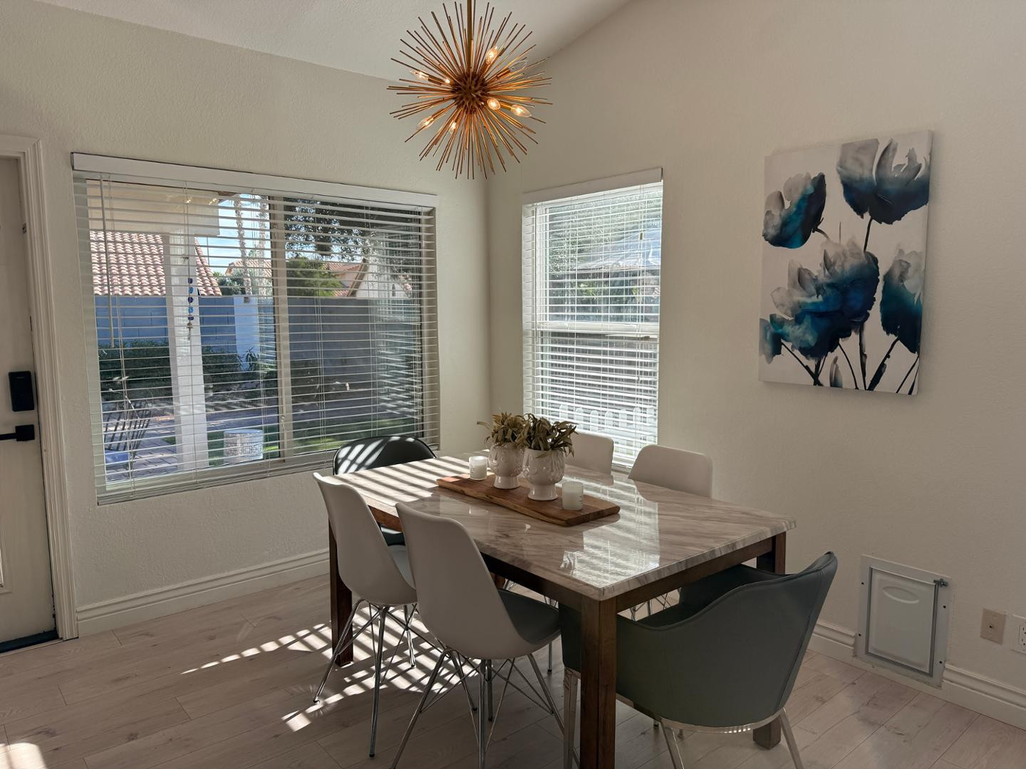 5449 East Phelps Road Scottsdale, AZ 85254 - Photo 12 of 28 a view of a dining room with furniture and window