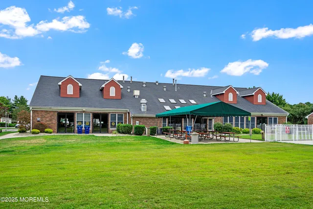 a view of a building with a big yard