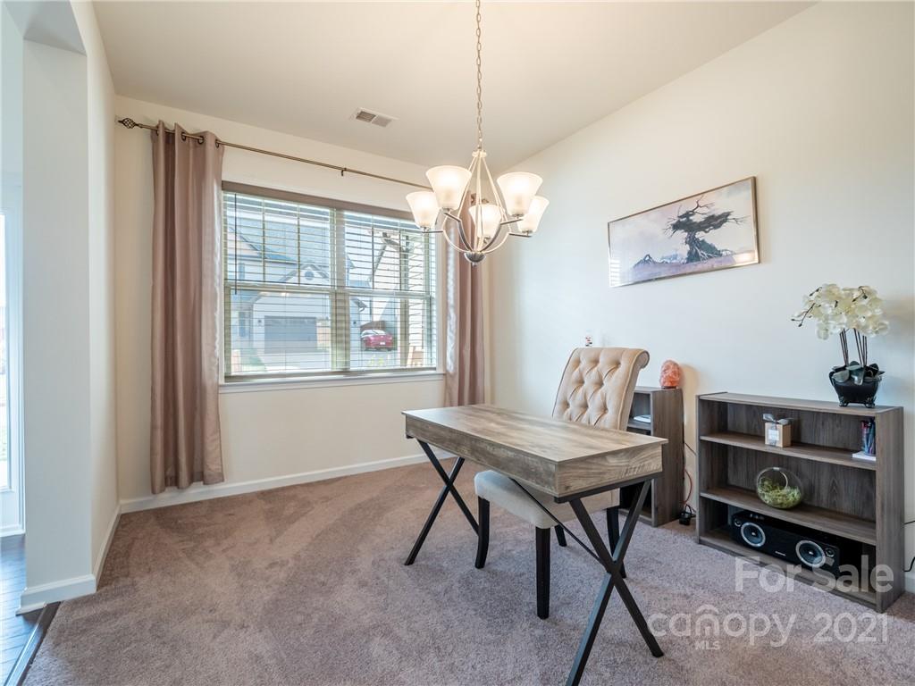 3 Henbit Way Arden, NC 28704 - Photo 11 of 46 a room with furniture and a window