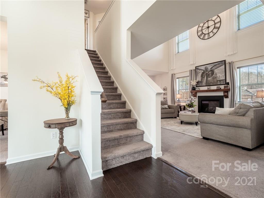3 Henbit Way Arden, NC 28704 - Photo 12 of 46 a living room with furniture and a fireplace