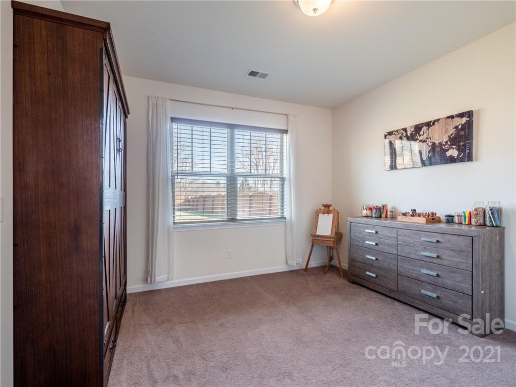 3 Henbit Way Arden, NC 28704 - Photo 15 of 46 a room with window and furniture