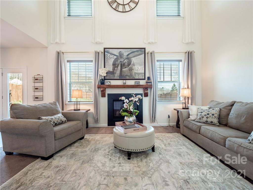 3 Henbit Way Arden, NC 28704 - Photo 19 of 46 a living room with furniture and a large window