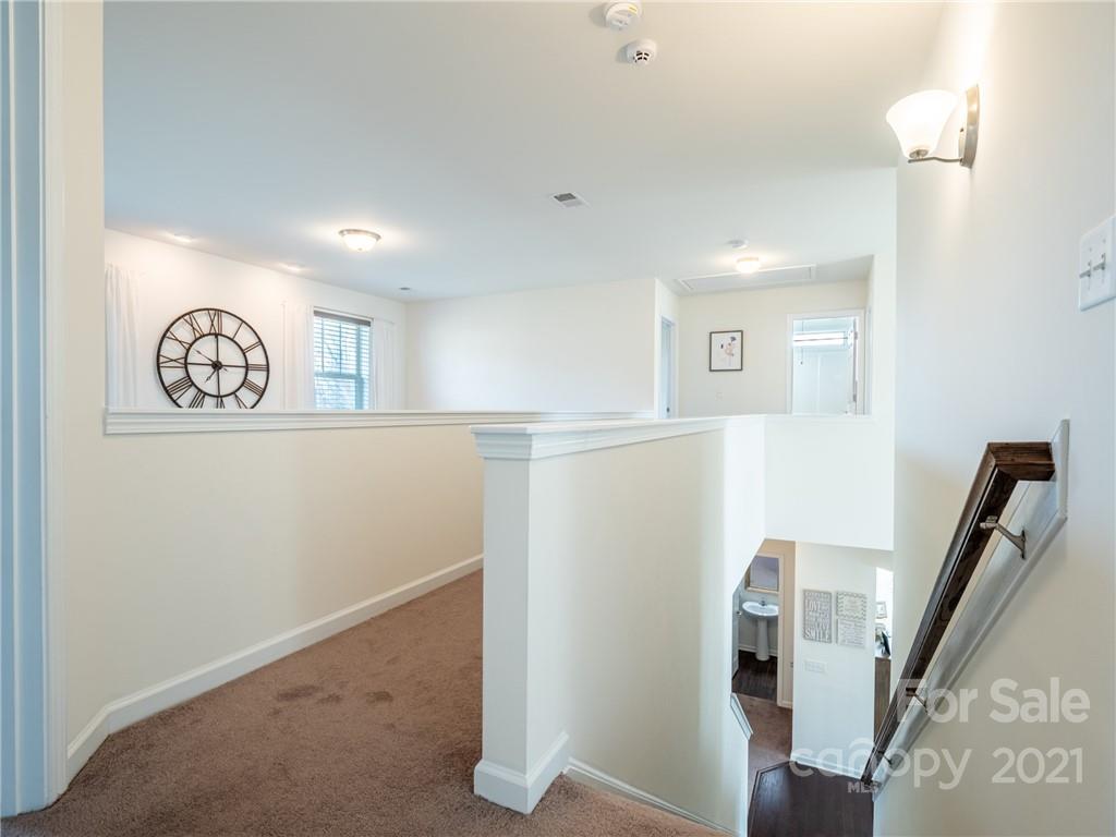 3 Henbit Way Arden, NC 28704 - Photo 28 of 46 a view of a hallway with workspace