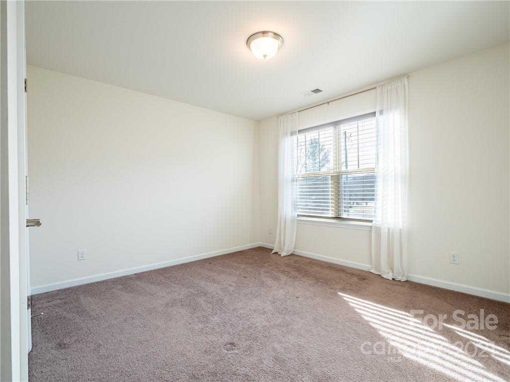 3 Henbit Way Arden, NC 28704 - Photo 29 of 46 an empty room with windows