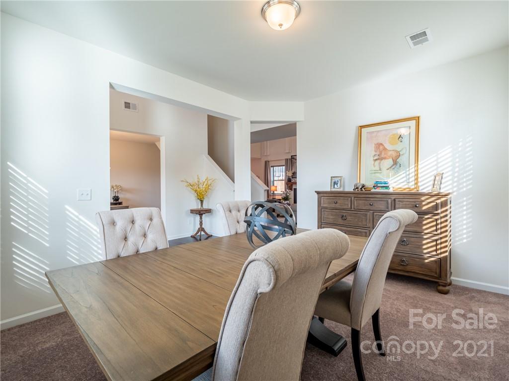 3 Henbit Way Arden, NC 28704 - Photo 10 of 46 a view of a dining room with furniture