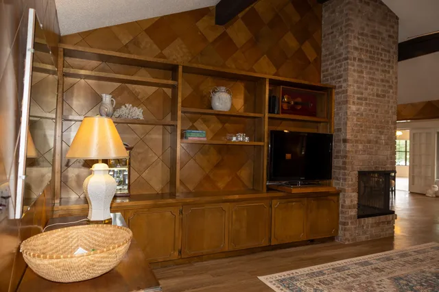 a kitchen with stainless steel appliances granite countertop a sink and stove