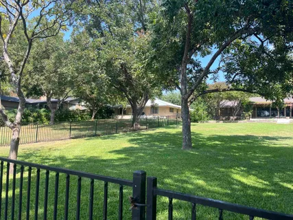 a bench sitting in front of a building