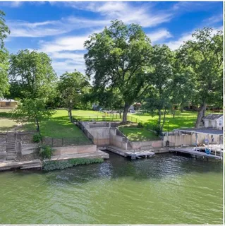 an aerial view of a house with garden space and outdoor space