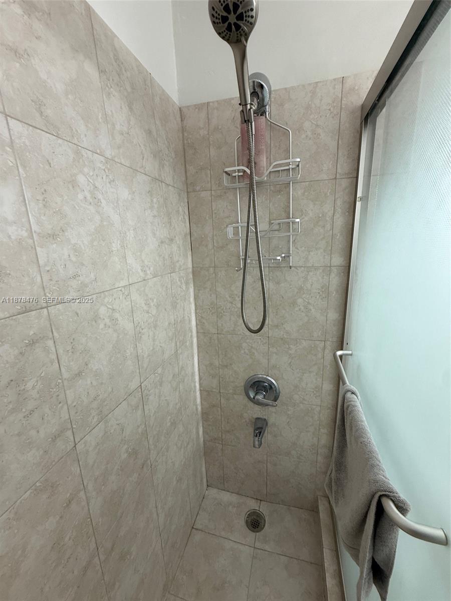 12413 Southwest 112th Terrace Miami, FL 33186 - Photo 15 of 16 a bathroom with a shower