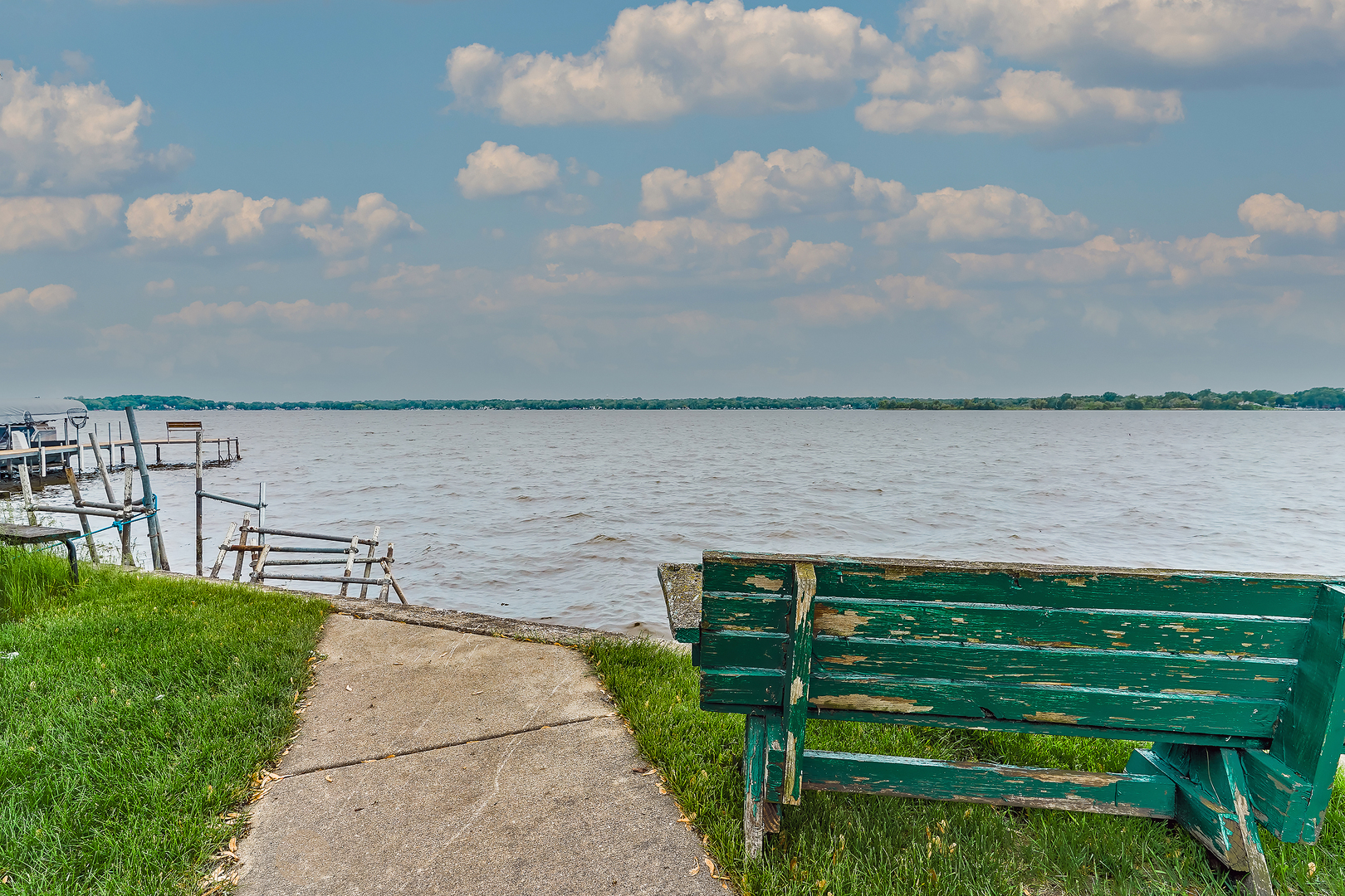 27 Arlington Road Fox Lake, IL 60020 - Photo 16 of 17 a view of a lake with a yard