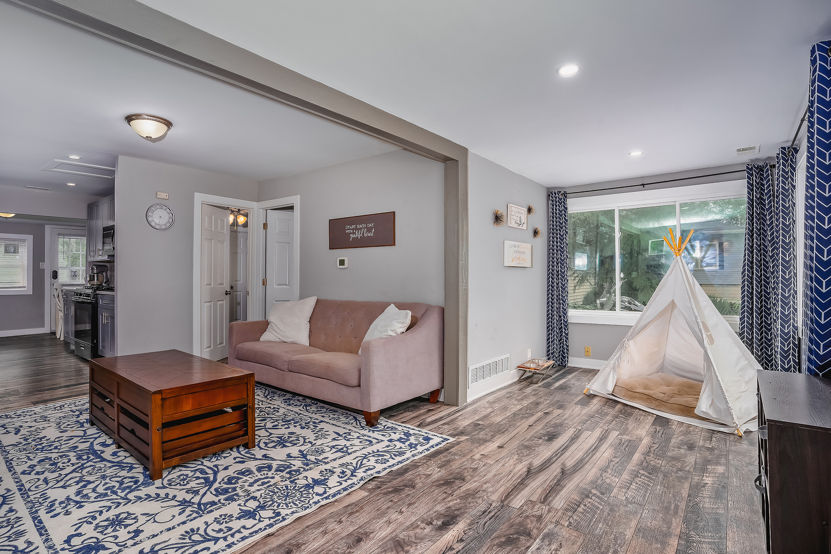 27 Arlington Road Fox Lake, IL 60020 - Photo 2 of 17 a living room with furniture and a wooden floor