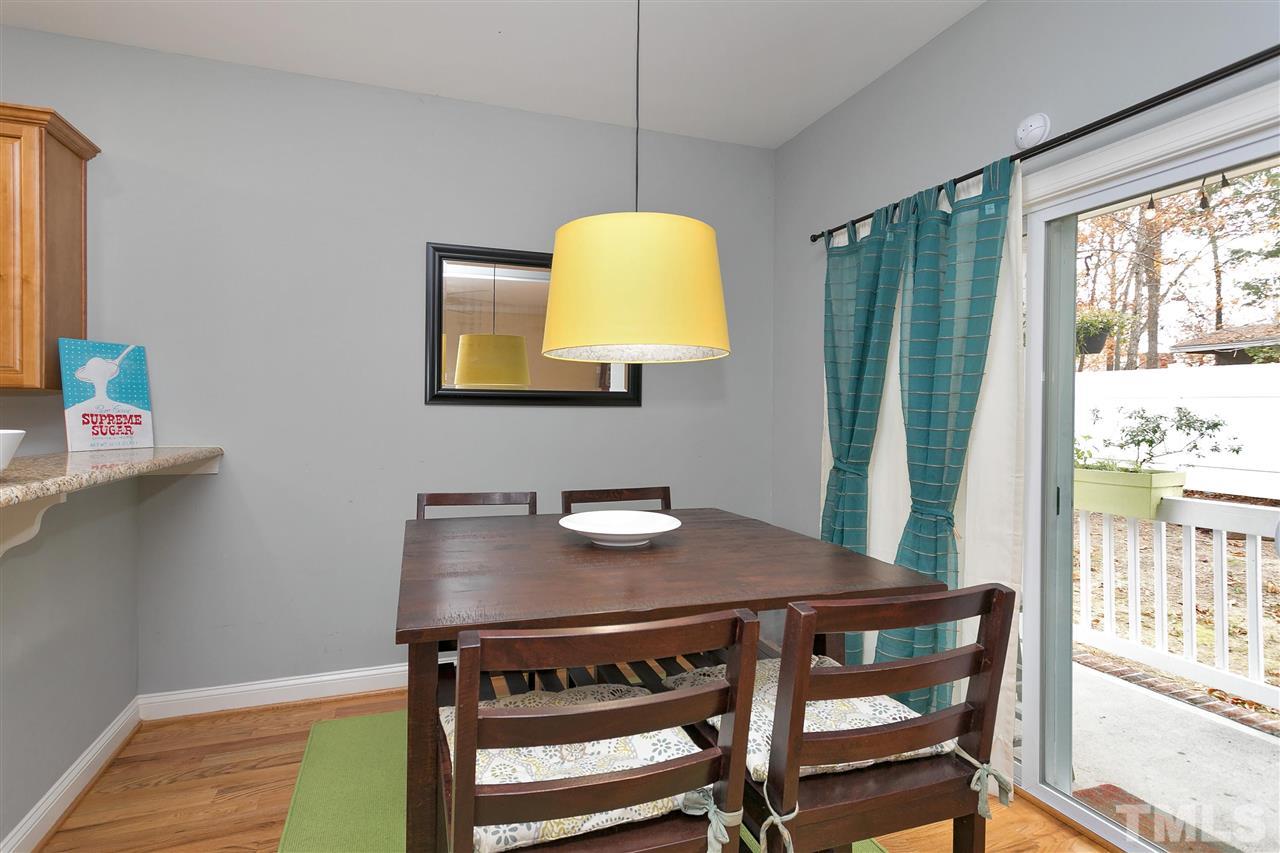 4630 Pat Reed Road Raleigh, NC 27616 - Photo 12 of 25 a view of a dining room with furniture and a window