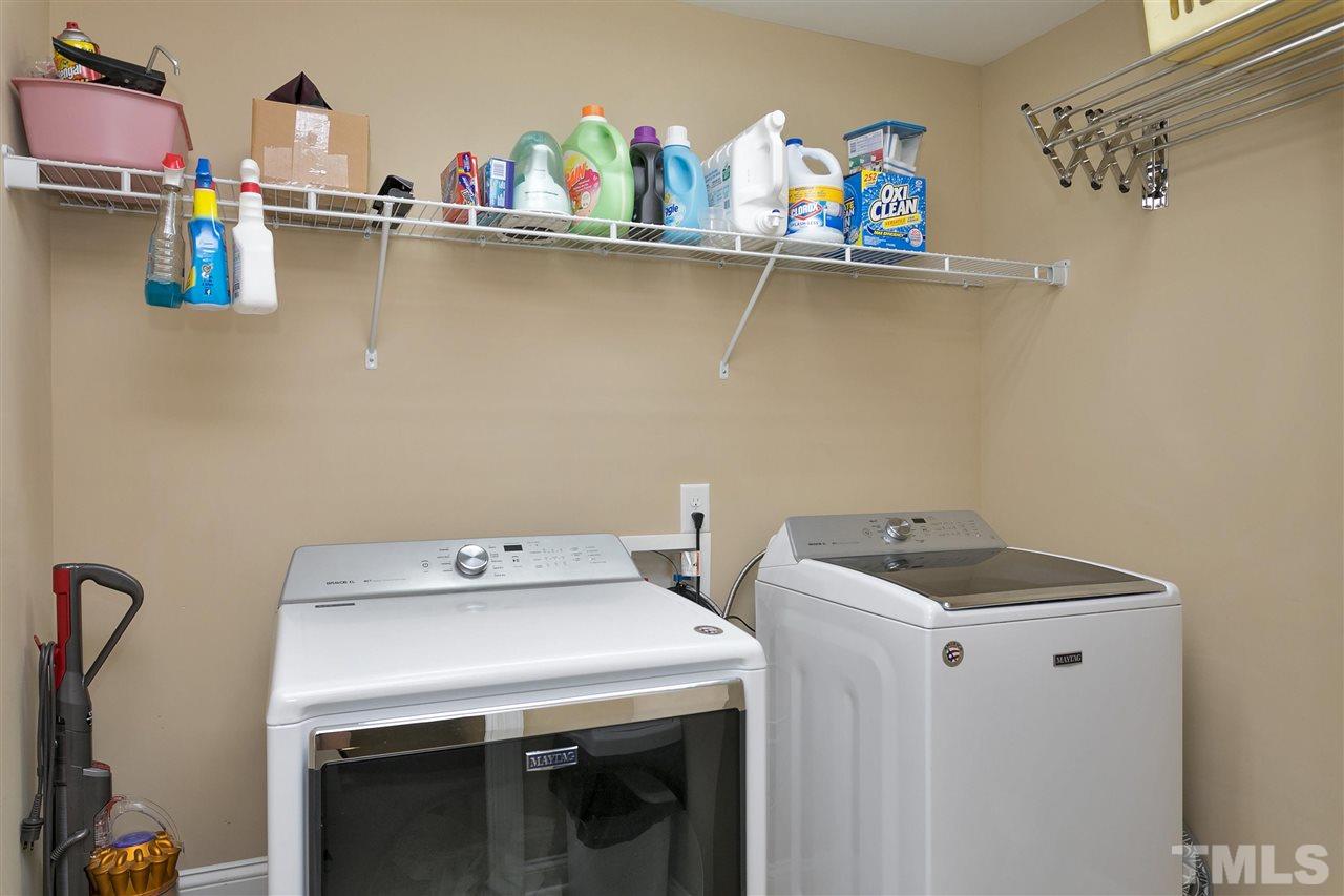 4630 Pat Reed Road Raleigh, NC 27616 - Photo 23 of 25 a utility room with dryer and washer