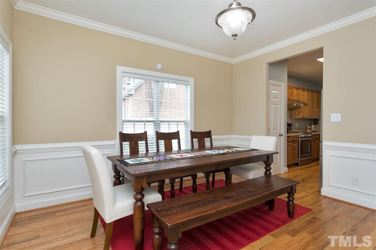 4630 Pat Reed Road Raleigh, NC 27616 - Photo 6 of 25 a view of a workspace with furniture and a window